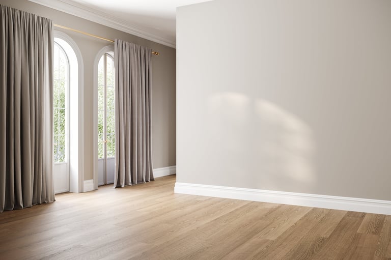 Elegant empty room interior with beige walls wooden floor and arched windows beautifully staged